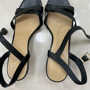Low heel cole Haan black sandals.